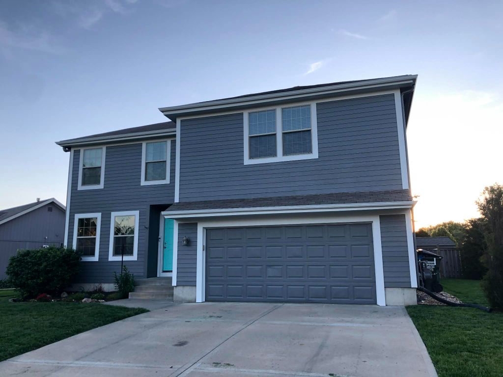 Modern Two-Story with Turquoise Door
